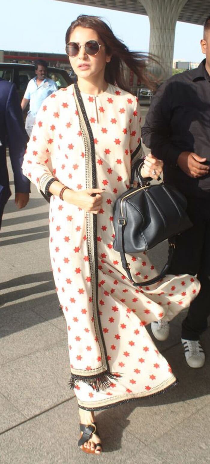 Anushka-Sharma-with-her-stylish-Louis-Vuitton-duffle-bag