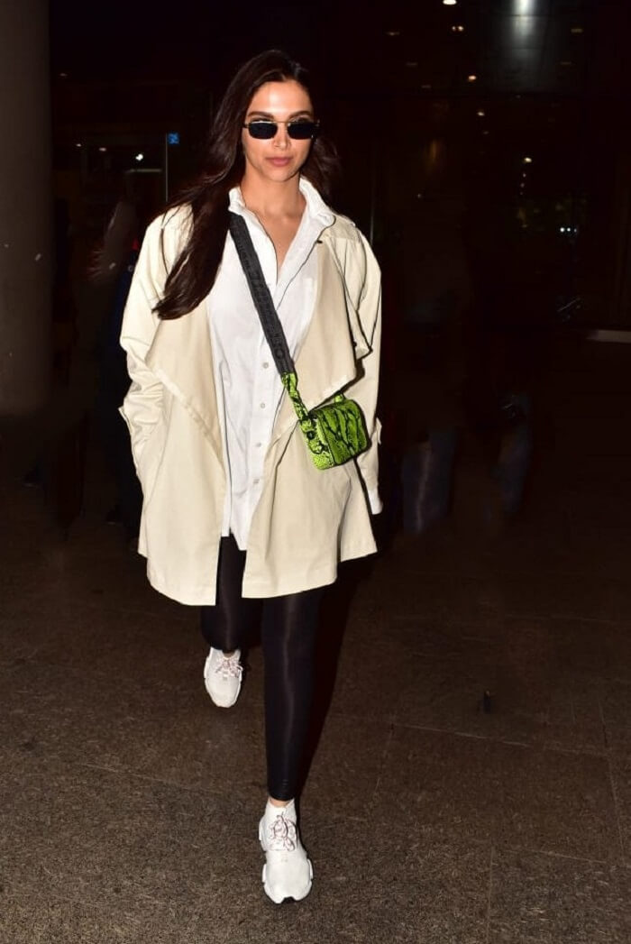 Deepika Padukone in a Louis Vuitton sweatsuit airport-style